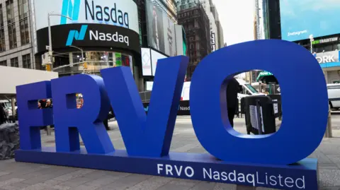 Bloomberg via Getty Images The letters FRVO stand outside the Nasdaq market on New York's Times Square. 