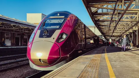 An Aurora Class 810 train at a station in the East Midlands. 