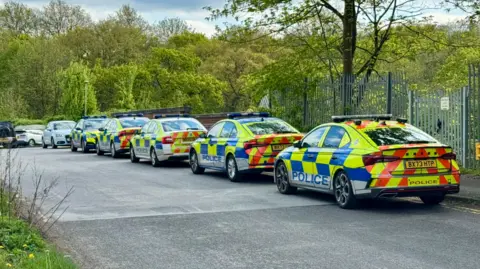 Leicester Media Online Multiple police cars parked on the side of a road in Leicester