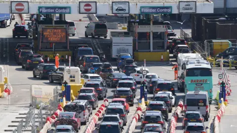 Gareth Fuller/PA Wire Queues of cars and coaches at the check-in at the Port of Dover