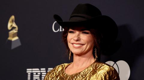 Canadian singer Shania Twain on a red carpet