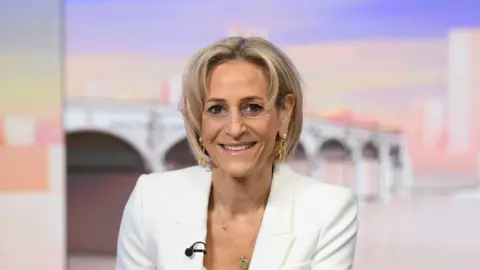 Emily Maitlis in a white jacket