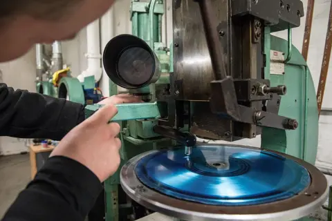 Getty Images A vinyl pressing plant, yesterday