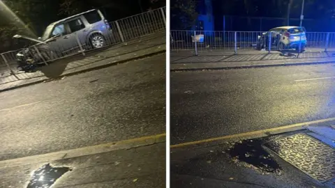 Eyewitness Two images of crashed cars. The image on the left shows a road with a crashed silver Land Rover behind a barrier. The image on the right shows a crashed silver hatchback behind a barrier.