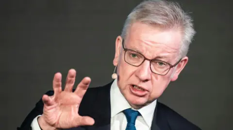 PA Michael Gove