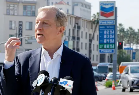 Getty Images Democratic governor candidate in California Tom Steyer speaks at a campaign event at a gas station in Los Angeles