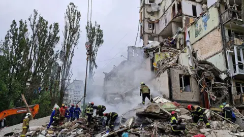 Roman Petushkov/Global Images Ukraine Three people were killed when an apartment block was brought down