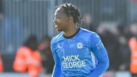 Getty Images New Stockport County defender Tayo Edun, pictured playing for Peterborough United