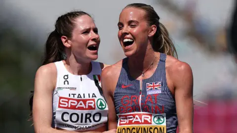 Eloisa Coiro of Team Italy and Keely Hodgkinson of Team Great Britain interact after competing in the Women's 800 Metres Semi-Finals 