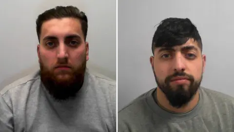 The image is a split-screen police mugshot showing two men photographed against plain, light‑coloured backgrounds. Both are wearing grey sweatshirts and have dark hair and beards. 