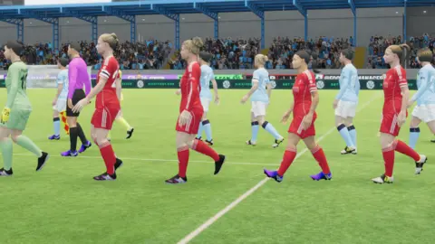Women's footballers walking in the video game. Players wearing Liverpool kits and Manchester City kits can be seen.