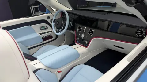 BBC/Danny Pike The interior of a two-seat Rolls-Royce convertible. 