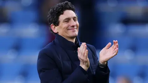 Brentford manager Keith Andrews applauds