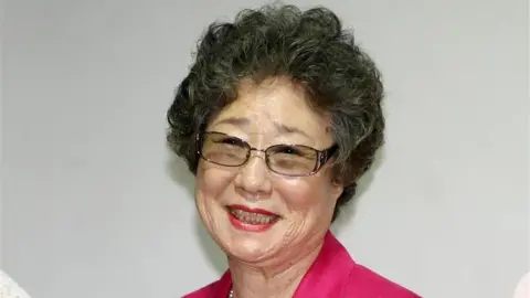News1 Choi Mal-ja in a pink coat, in a picture taken just before the verdict
