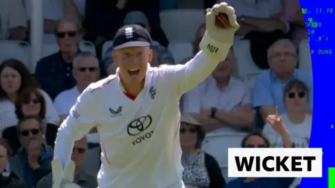 James Rew reacts to England's first wicket of the day against New Zealand 