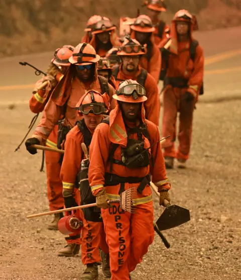 Getty Images Inmate firefighters tasked with battling the Thompson fire in Oroville, California.