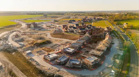 Drone view of a residential construction site in the UK - stock photo