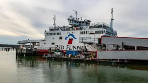 Getty Images A stationary Red Funnel ferry in the dock at Southampton