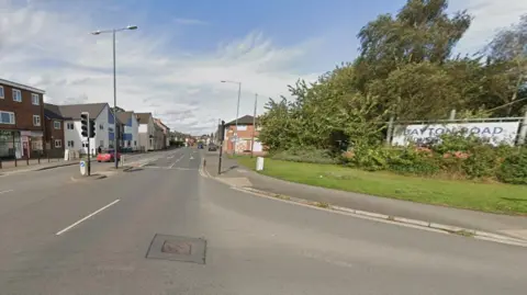 A generic image of Coventry Road showing buildings on the left and right of the street on the left hand side of the photo. Traffic lights are at the junction in the foreground.