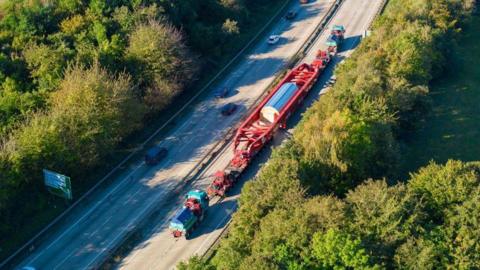 The abnormal load being transported on a road