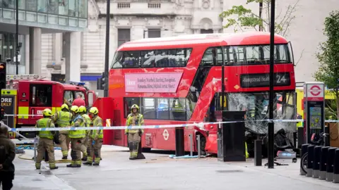 Emergency services at the scene on Allington Street, London, following a double-decker bus crash on 4 September 2025.