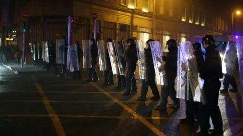  EPA-EFE/REX/Shutterstock Public order officers on duty during Dublin riot