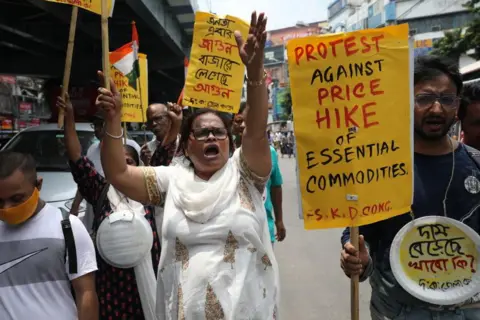 Getty Images Supporters of the Indian National Congress are taking part in a protest march and shouting slogans against the price hike of essential commodities and other food items, in Kolkata, India, on July 11, 2024 