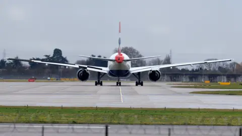 Getty Images The back of a plane as it taxi's on a runway at Heathrow in 2025.