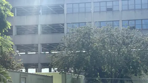 Andrew Turner/BBC Demolition of the former Marsh office building in Norwich