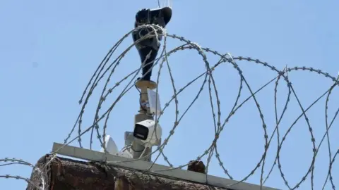 Eddie Mitchell A damaged CCTV camera.