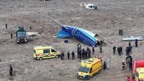 A drone view shows the crash site of an Azerbaijan Airlines passenger plane near the city of Aktau, Kazakhstan