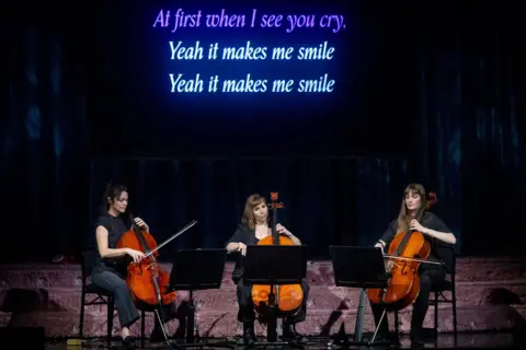 Getty Images Dallas Minor Trio performs Lily Allen covers at The Orpheum Theatre on April 26, 2026 in Los Angeles, California.
