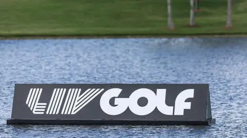 A LIV Golf logo floating on water
