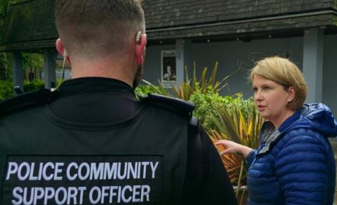 Katherine Fletcher with a police and community support officer