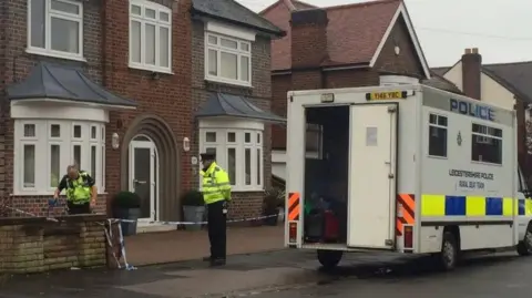 A police cordon outside a house in Leicester