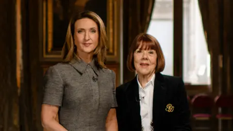 Victoria Derbyshire standing nexy to Gisèle Pelicot. 