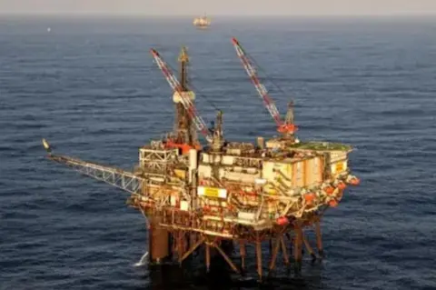 CNR A picture of an offshore platform - Ninian Southern - in the North Sea, with the horizon in the distance.