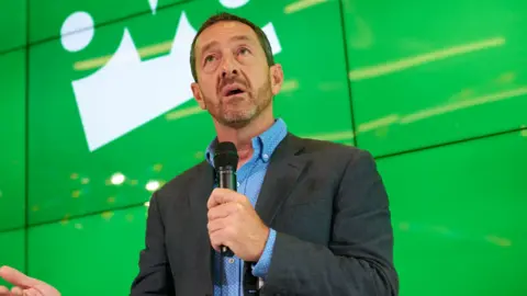 Getty Images Chris Boardman speaking at a public event