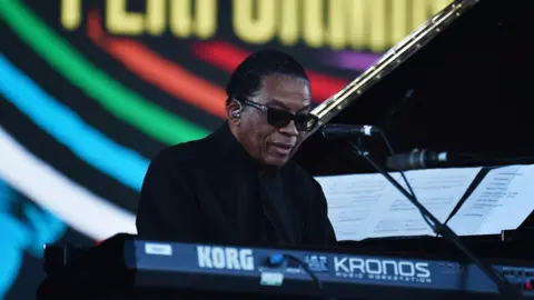 Herbie Hancock playing a Korg keyboard at Glastonbury