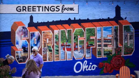 Getty Images A mural reads "Greetings from Springfield, Ohio"