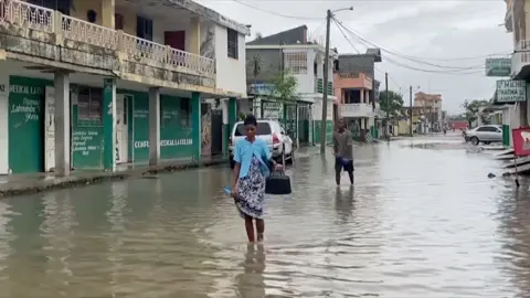 People in Haiti are navigating the town after it got flooded from Hurricane Melissa.