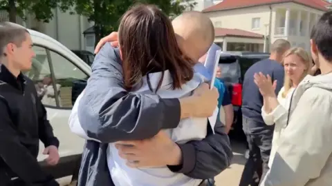 Svetlana Tikhanovskaya Belarus opposition leader Sergei Tikhanovsky hugs his wife Svetlana Tikhanovskaya