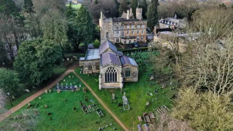 Peterborough From Above A drone image taken from above of the church and its graveyard.