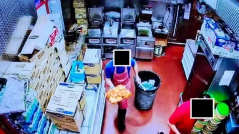 Home Office CCTV image of a fast food takeaway's kitchen