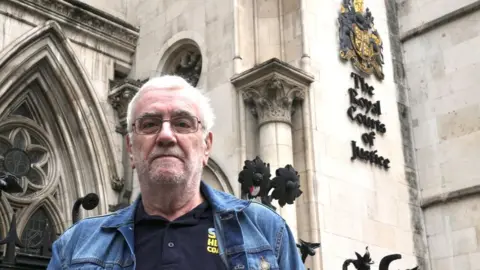 John Fairhall/BBC Kevin Jordan outside the High Court