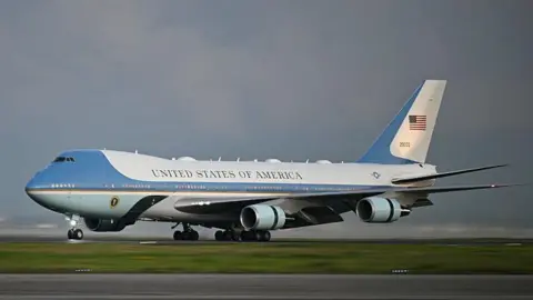 AFP via Getty Images Air Force One lands in Tokyo, Japan  in October 2025