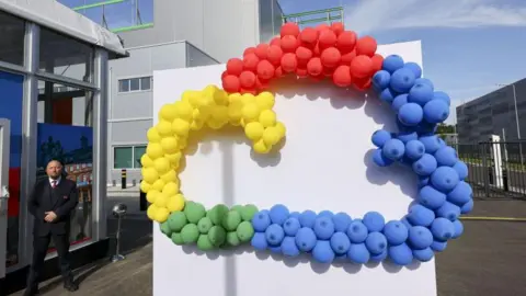 Getty Images A cloud shape made up of colourful balloons