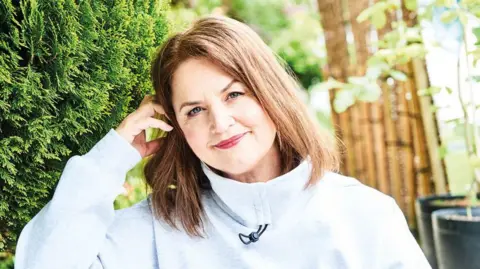 Tom Jackson A close up image of Ruth Jones outdoors smiling to camera