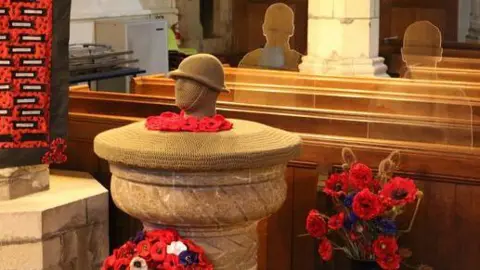 Hazel Roots, Kim Frazer and Susie Parr Crochet head of a soldier