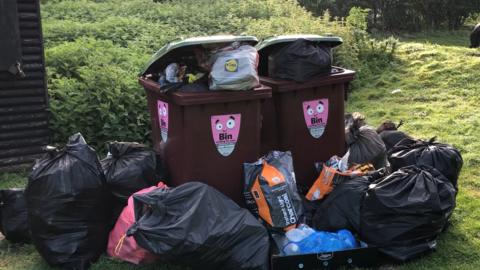 Rubbish left behind at Needham Lakes